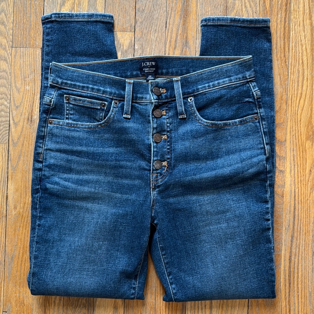 J. Crew Mid Rise button fly semi-distressed skinny jeans
